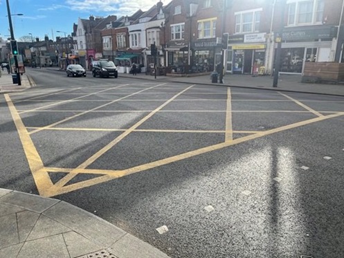 Image of a yellow box junction near mayow road in Sydenham